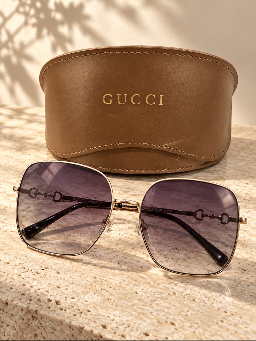 Gucci Gold Frame Sunglasses with Gradient Purple Lenses